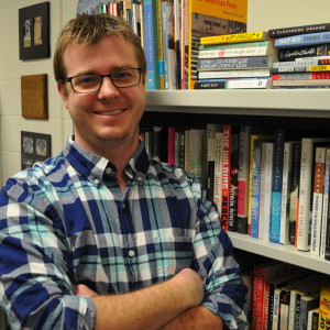English Professor Marc Dickinson in his office in Building 2. He advises the Creative Writing Club. It meets Wednesdays at 12:15 p.m. in 2-7