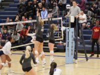 Amber Dilsaver and Gill Tupper rise for a block against Iowa Central.